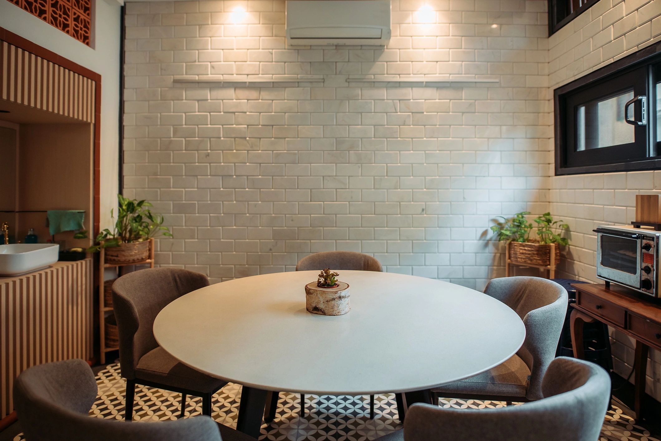 Warm, modern restaurant dining room interior with ambient lighting